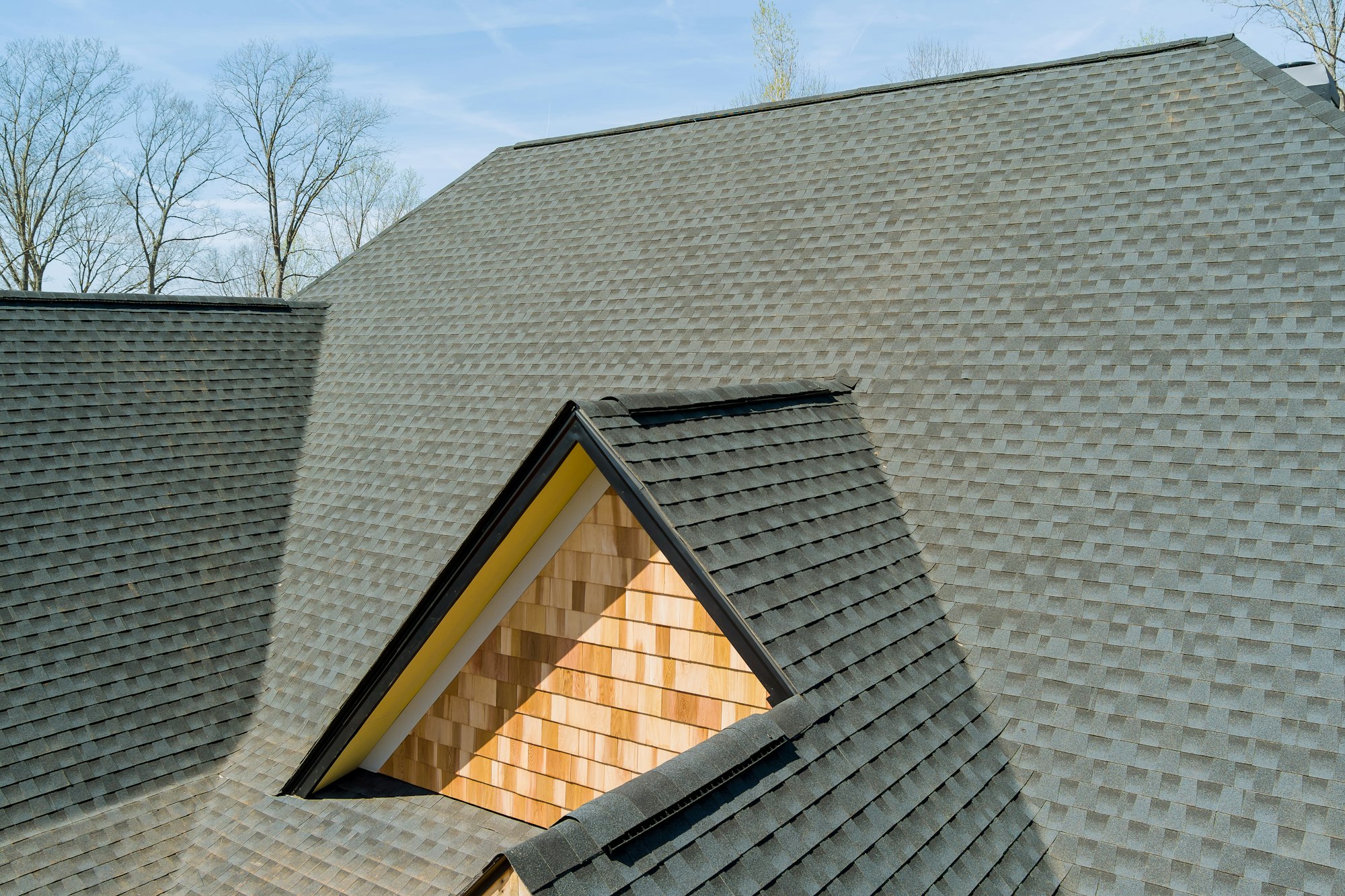 When installing top covering of asphalt shingles on a new house, the quality of roof work is